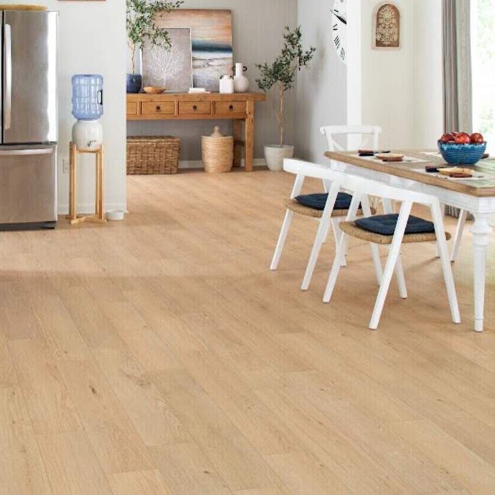 Light wood flooring in an open concept dining room