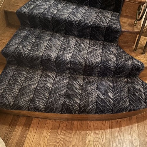 Stair runner installation on spiral staircase in Portland OR